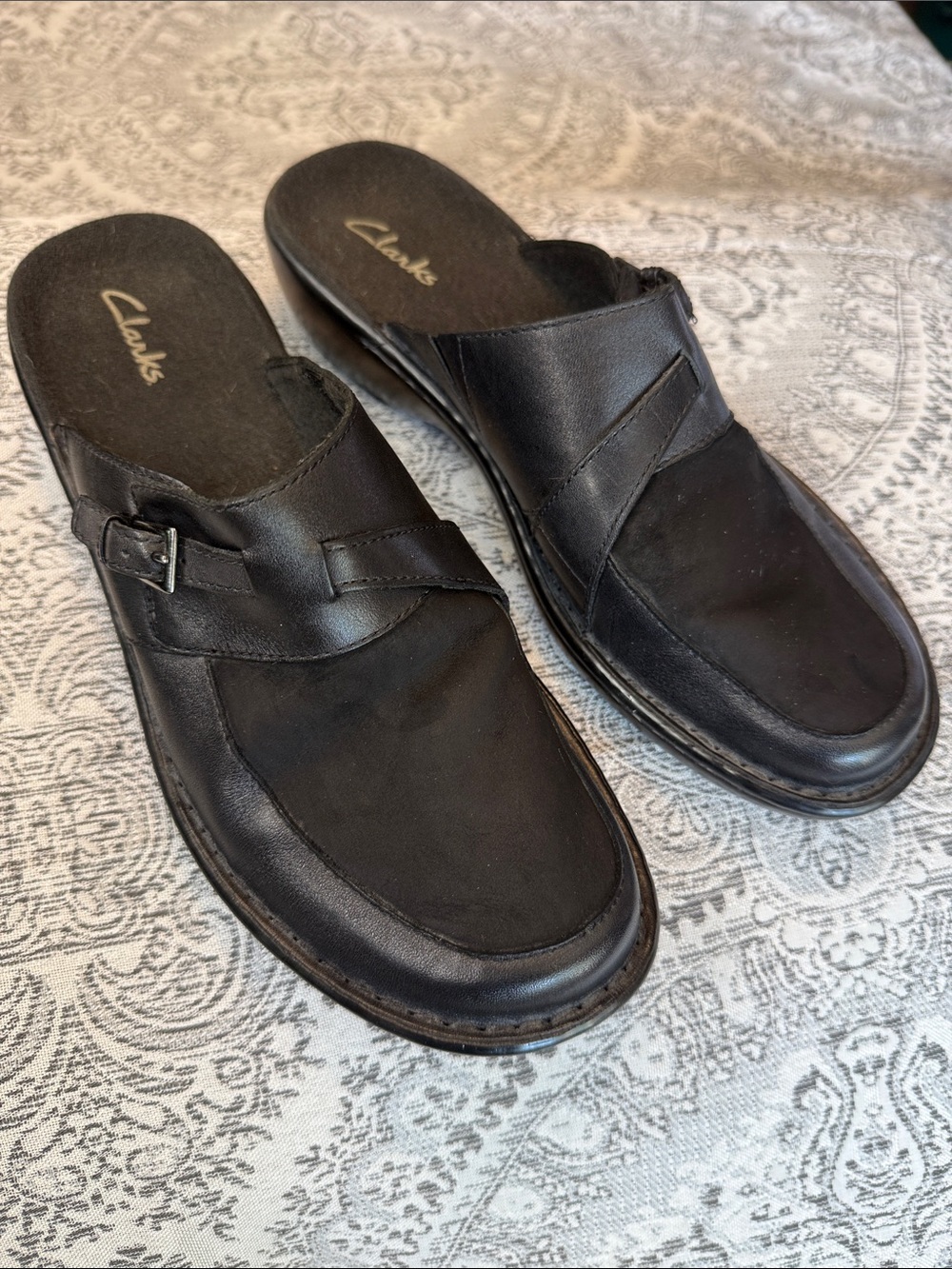 Women’s Clarks Black Leather Slip-On Clogs with Buckle Accent - Size 8.5